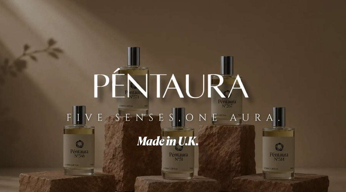 Péntaura luxury perfume bottles displayed on stone pedestals with the tagline “Five Senses, One Aura” and “Made in U.K.