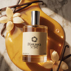 A bottle of Péntaura No 397 perfume with a cream label and silver cap, styled on a glossy amber dish with vanilla beans and cream orchid flowers on a marble surface.