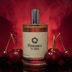 Pentaura No. 494 perfume bottle with a beige label and silver cap, centered on a red smoky background and flanked by glossy red cherries.